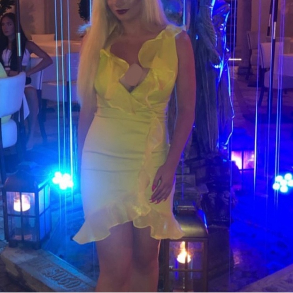 Form fitting yellow mini dress